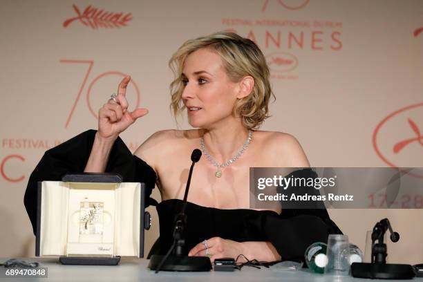 Diane Kruger, winner of the award for best actress for her part in the movie "In The Fade" attends the Palme D'Or winner press conference during the...