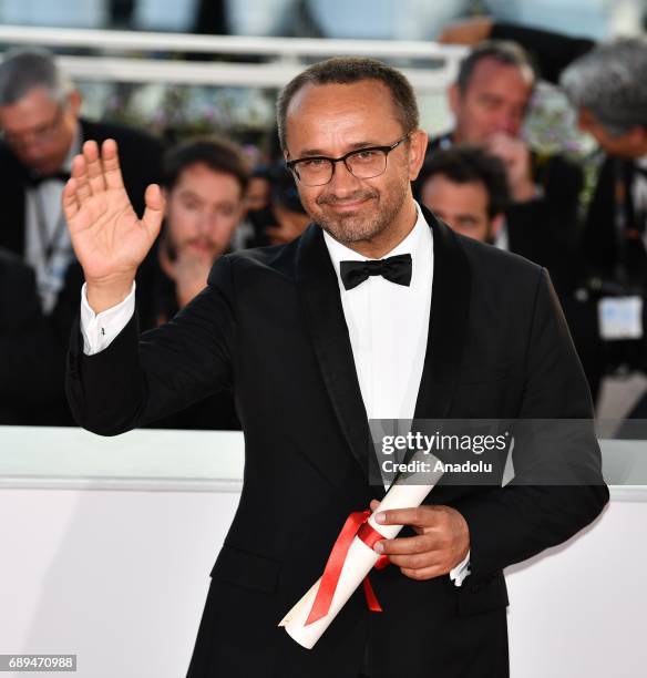 Russian director Andrey Zvyagintsev poses during the Award Winners photocall after he won the Jury Prize for the film Nelyubov at the 70th annual...