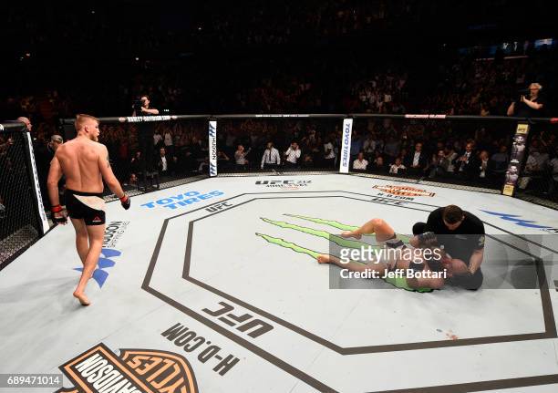 Alexander Gustafsson celebrates his knockout victory over Glover Teixeira in their light heavyweight fight during the UFC Fight Night event at the...