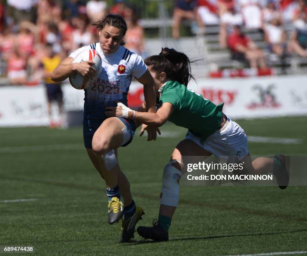 France vs Ireland on day two of HSBC Canada WomenÕs Sevens Rugby action at Westhills Stadium in Langford, BC, May 28, 2017. / AFP PHOTO / Don...