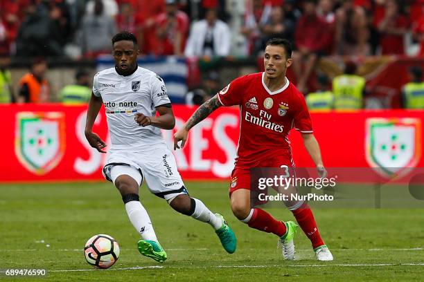 Vitoria SC's forward Hernani vies for the ball with Benfica's defender Alejandro Grimaldo during the Portugal Cup football final match between SL...