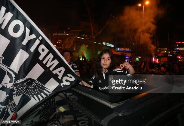 Besiktas fans celebrate after they won their 15th Turkish Spor Toto Super Lig title by defeating Gaziantepspor 4-0, in Istanbul, Turkey on May 28,...