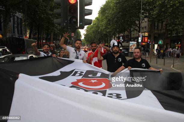 Besiktas fans celebrate after they won their 15th Turkish Spor Toto Super Lig title by defeating Gaziantepspor 4-0, in Cologne, Germany on May 28,...