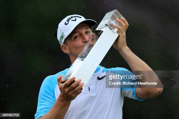 Alex Noren of Sweden with the trophy after winning the BMW PGA Championship at Wentworth on May 28, 2017 in Virginia Water, England.
