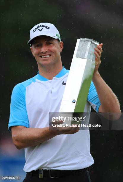 Alex Noren of Sweden with the trophy after winning the BMW PGA Championship at Wentworth on May 28, 2017 in Virginia Water, England.