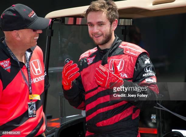 Musician ZEDD moments after taking a parade lap in a doubleseater Indy car driven by Mario Andretti during the 101st Indianapolis 500 at Indianapolis...