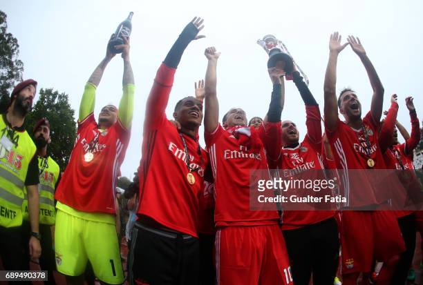 Benfica's players celebrate with trophy after winning the Portuguese Cup Title at the end of the Portuguese Cup Final match between SL Benfica and...