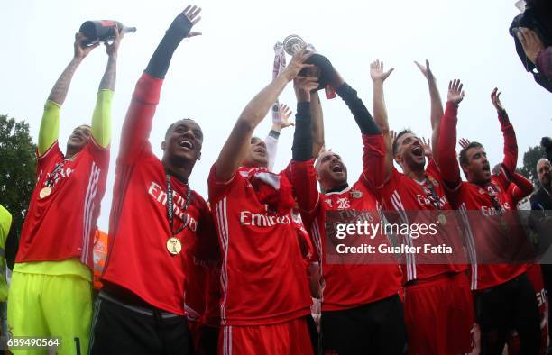 Benfica's players celebrate with trophy after winning the Portuguese Cup Title at the end of the Portuguese Cup Final match between SL Benfica and...