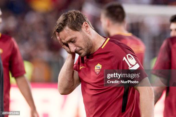 Francesco Totti looks dejected after his last appearance in Rome after more than 20 years during the Serie A match between Roma and Genoa at Stadio...