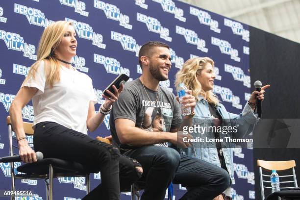 Katie Cassidy, Josh Segarra and Emily Bett Rickards take part in the Arrow Panel on day two of Heroes and Villians Convention at Olympia London on...