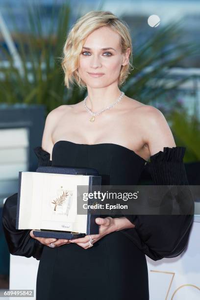 Actress Diane Kruger, who won the award for best actress for her part in the movie 'In The Fade' , attends the Palme D'Or Winner Photocall during the...