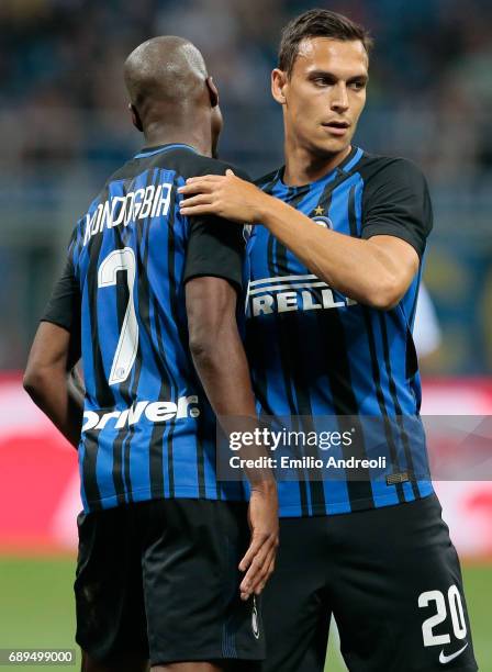 Trent Lucas Sainsbury of FC Internazionale Milano celebrates with his teammate Geoffrey Kondogbia during the Serie A match between FC Internazionale...