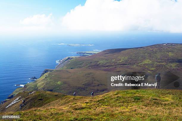 hiking on slieve league, donegal, ireland - slieve league donegal stock pictures, royalty-free photos & images