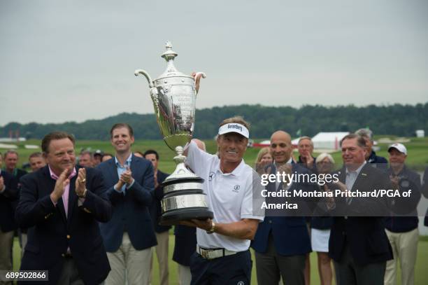 Bernard Langer of Germany receives the Alfred S. Bourne trophy during Presentation Ceremony the for the 78th KitchenAid Senior PGA Championship at...