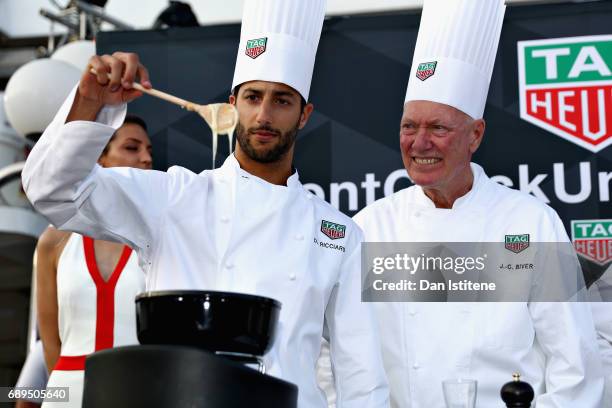 Daniel Ricciardo of Australia and Red Bull Racing and TAG Heuer CEO Jean-Claude Biver at the TAG Heuer Culinary Challenge on May 27, 2017 in...