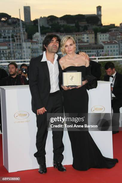 Diane Kruger winner of the award for best actress for her part in the movie 'In The Fade' and director Fatih Akin attend the winners photocall during...