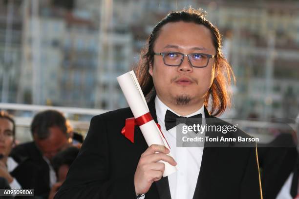 Qiu Yang winner of the award for Best Short for 'A Gentle Night' attends the winners photocall during the 70th annual Cannes Film Festival at Palais...