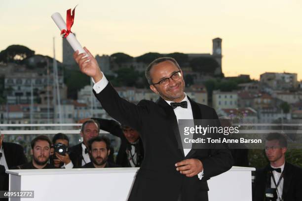 Andrey Zvyagintsev, who won the Prix Du Jury for the movie 'Loveless' attends the winners photocall during the 70th annual Cannes Film Festival at...