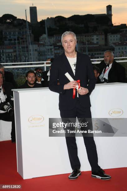 Robin Campillo winner of the Grand Prix for the movie '120 Beats Per Minute' attends the winners photocall during the 70th annual Cannes Film...