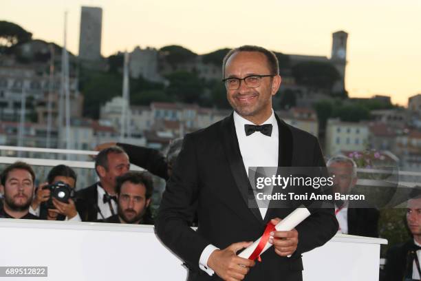 Andrey Zvyagintsev, who won the Prix Du Jury for the movie 'Loveless' attends the winners photocall during the 70th annual Cannes Film Festival at...