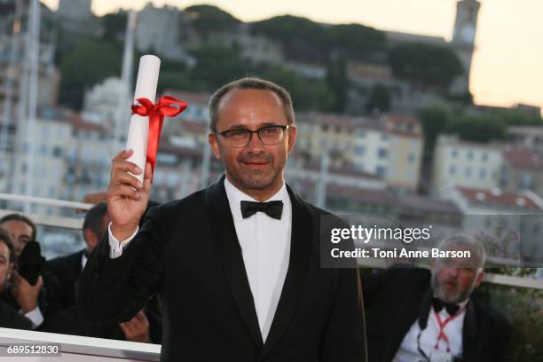 Andrey Zvyagintsev, who won the Prix Du Jury for the movie 'Loveless' attends the winners photocall during the 70th annual Cannes Film Festival at...