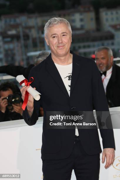 Robin Campillo winner of the Grand Prix for the movie '120 Beats Per Minute' attends the winners photocall during the 70th annual Cannes Film...