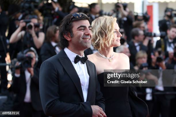 Director Fatih Akin and Diane Kruger attend the Closing Ceremony of the 70th annual Cannes Film Festival at Palais des Festivals on May 28, 2017 in...