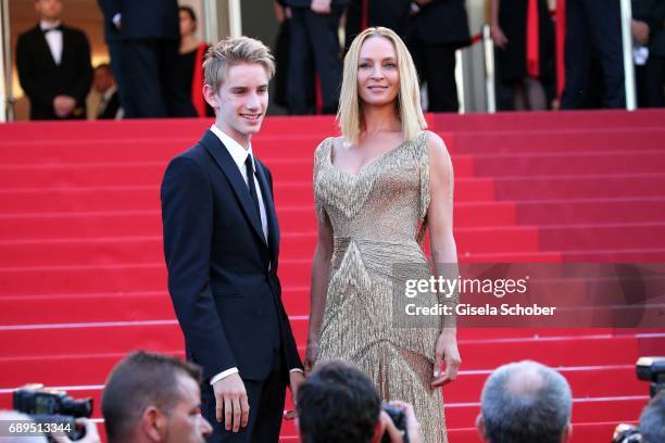 President of the Un Certain Regard jury Uma Thurman and her son Levon Roan Thurman-Hawke attend the Closing Ceremony during the 70th annual Cannes...