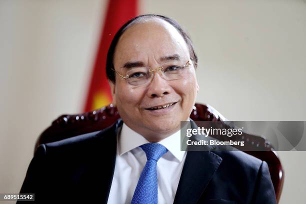 Nguyen Xuan Phuc, Vietnam's prime minister, sits for a photograph during an interview in Hanoi, Vietnam, on Saturday, May 27, 2017. Phuc said he is...