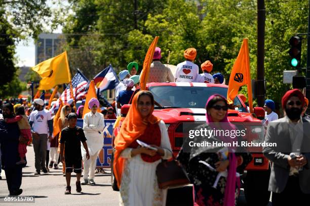 Hundreds of American Sikhs take part in the second annual American Sikh day parade march by on May 28, 2017 in Denver, Colorado. The Sikhs hold the...