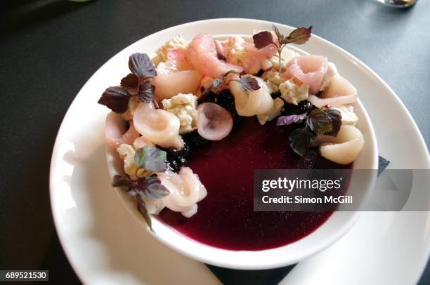 baked lemon ricotta with cassis jelly, roasted peaches and white chocolate rocky road - cassis fruit stock pictures, royalty-free photos & images