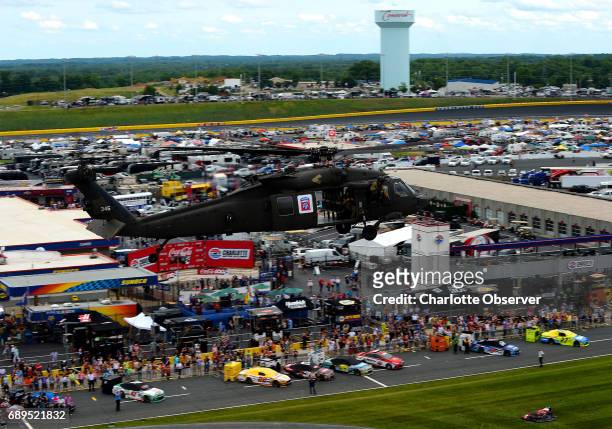Blackhawk helicopter flies over the infield of Charlotte Motor Speedway on Sunday, May 28, 2017 prior to the running of the Coca-Cola 600 race.