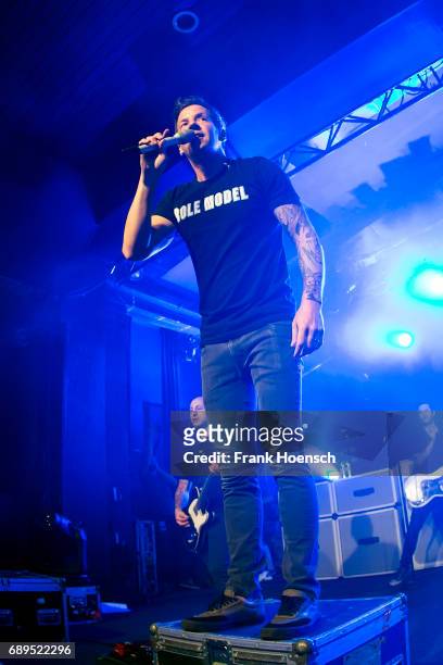 Jeff Stinco, Pierre Bouvier and Sebastien Lefebvre of the Canadian band Simple Plan perform live on stage during a concert at the Astra on May 28,...