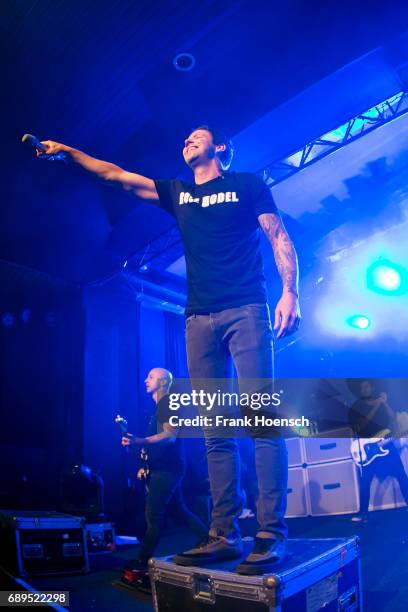 Jeff Stinco, Pierre Bouvier and Sebastien Lefebvre of the Canadian band Simple Plan perform live on stage during a concert at the Astra on May 28,...