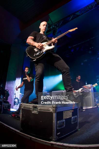 Pierre Bouvier, Jeff Stinco and Sebastien Lefebvre of the Canadian band Simple Plan perform live on stage during a concert at the Astra on May 28,...