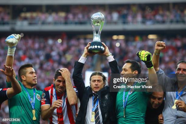 Matias Almeyda coach of Chivas lifts the champions trophy after the Final second leg match between Chivas and Tigres UANL as part of the Torneo...