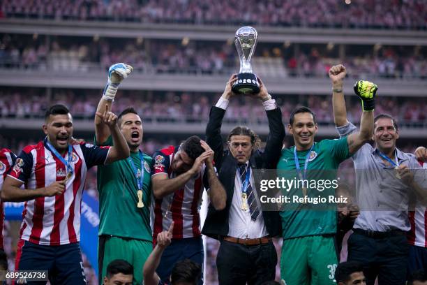 Matias Almeyda coach of Chivas lifts the champions trophy after winning the Final second leg match between Chivas and Tigres UANL as part of the...