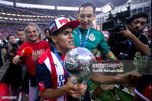 Jesus Sanchez and Rodolfo Cota goalkeeper of Chivas celebrate with the champions trophy after winnig the Final second leg match between Chivas and...
