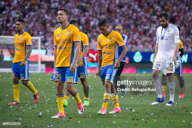 Jesús Dueñas, Victor Sosa and Enrique Palos goalkeeper of Tigres look dejected after losing the Final second leg match between Chivas and Tigres UANL...