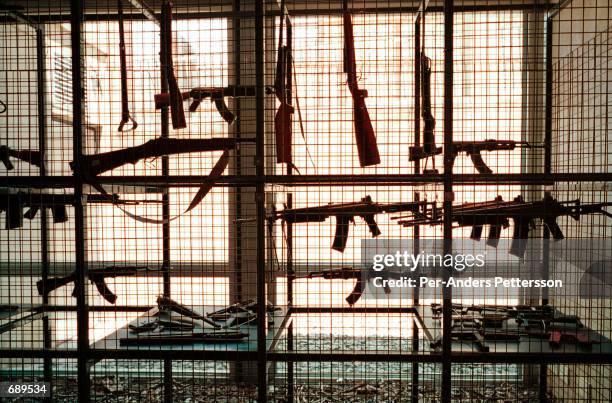 Handmade guns confiscated by the South African police are on display at the Apartheid museum December 19, 2001 in Johannesburg, South Africa. The...