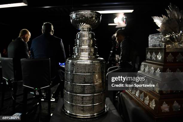 The Stanley Cup and the Conn Smythe Trophy are displayed during the NHL Stanley Cup Final Media Day at PPG Paints Arena in Pittsburgh on May 28, 2017.