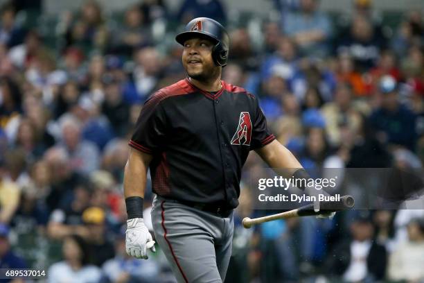 Yasmany Tomas of the Arizona Diamondbacks walks back to the dugout after striking out in the second inning against the Milwaukee Brewers at Miller...