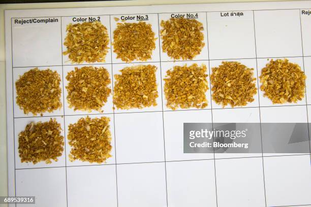 Garlic samples sit on a piece of paper at a quality control area of the Nithi Foods Co. Factory in the San Pa Tong district of Chiang Mai, Thailand,...