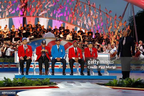 Host Laurence Fishburne pays tribute to members of The Tuskegee Airmen at PBS' 2017 National Memorial Day Concert at U.S. Capitol, West Lawn on May...