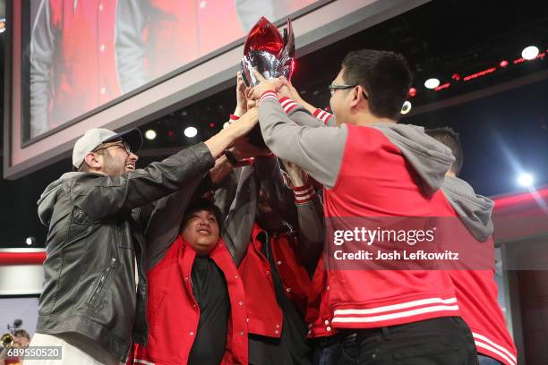 Marko Sosnicki, Andrew Smith, Tony Chau, Cody Altman, John Le and Markus Kwak hold the championship trophy up after defeating the University of...