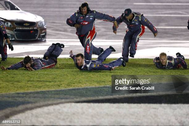 Austin Dillon, driver of the DOW Salutes Veterans Chevrolet, celebrates with his crew after winning the Monster Energy NASCAR Cup Series Coca-Cola...