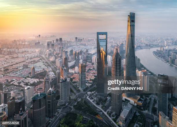 overlook of three skyscrapers in lujiazui district,shanghai - pudong fotografías e imágenes de stock