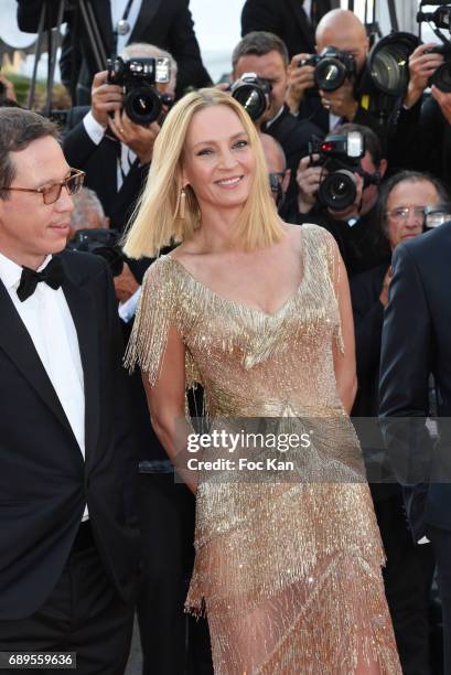 Reda Kateb and Uma Thurman attend the Closing Ceremony during the 70th annual Cannes Film Festival at Palais des Festivals on May 28, 2017 in Cannes,...