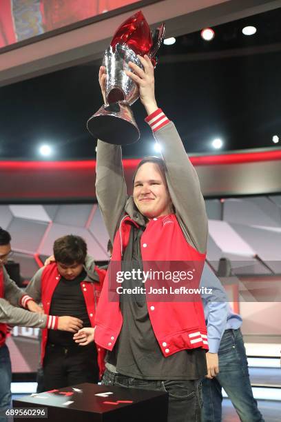 Marko Sosnicki holds the championship trophy at the League of Legends College Championship between Maryville University and the University of Toronto...