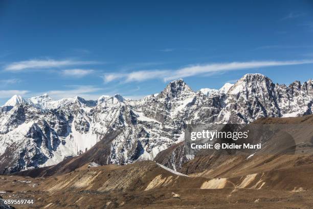stunning view of the gokyo valley from cho la pass in the himalayas in nepal - gokyo valley stock pictures, royalty-free photos & images